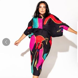 Dressed in LALA Woman of the Hour Midi Dress